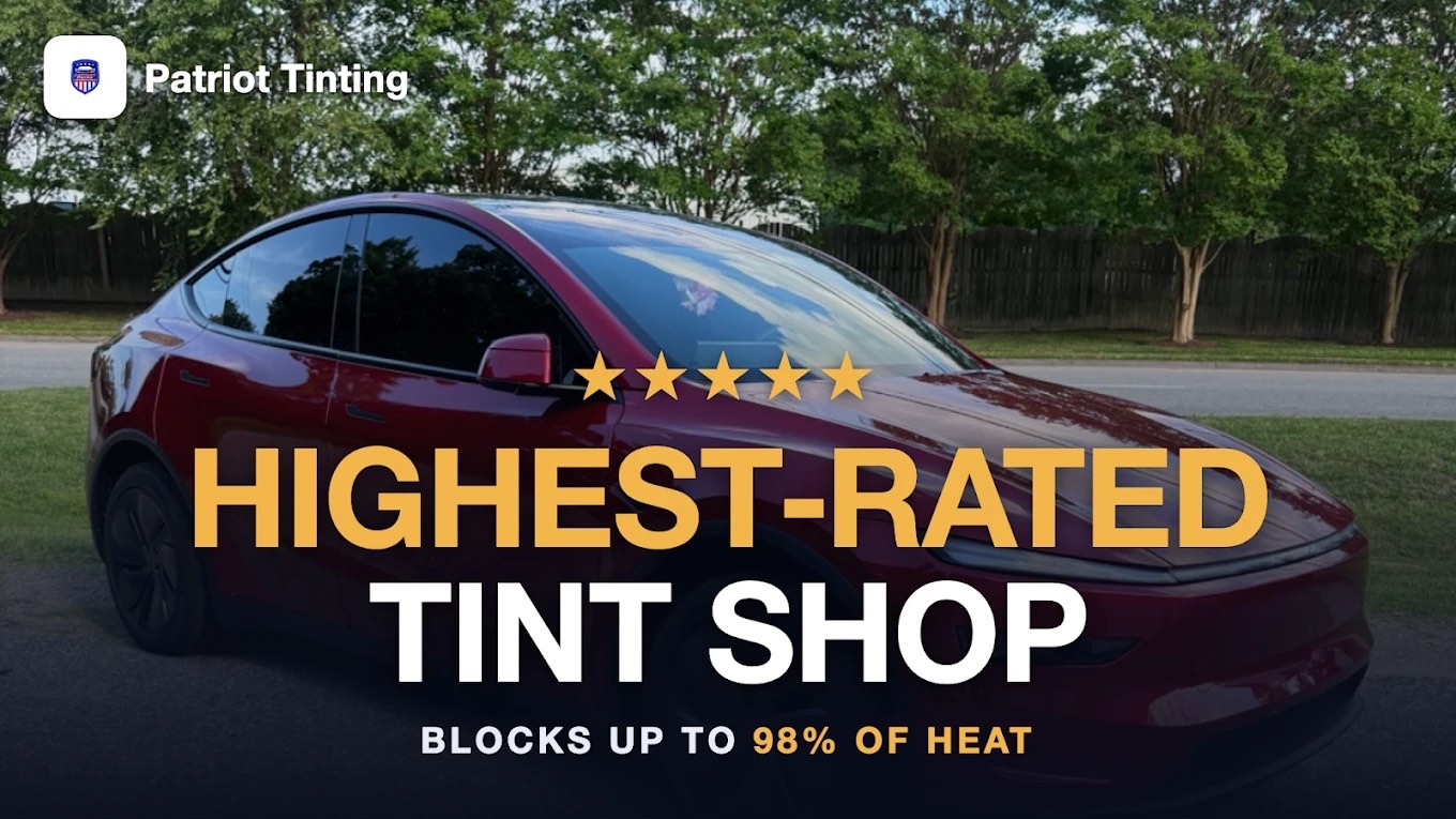 Red Tesla Model Y with dark window tint. Highest-rated tint shop, blocks up to 98% of infrared heat.