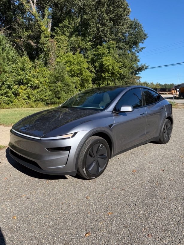 Tesla Model Y with fresh window tint on the Patriot Tinting lot